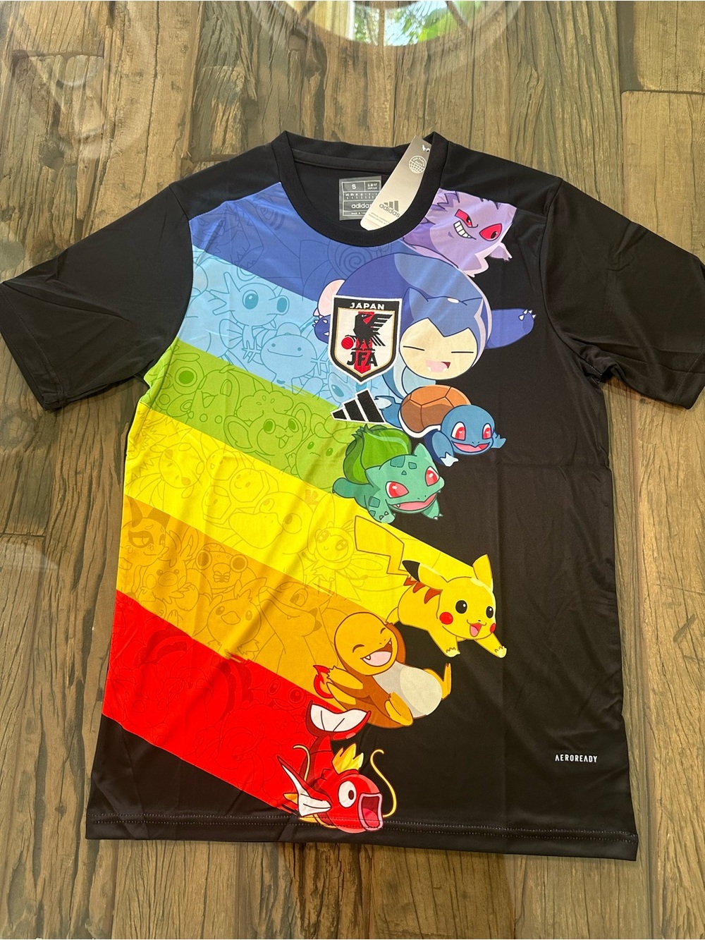 Black Pokémon Jersey with Rainbow Stripe